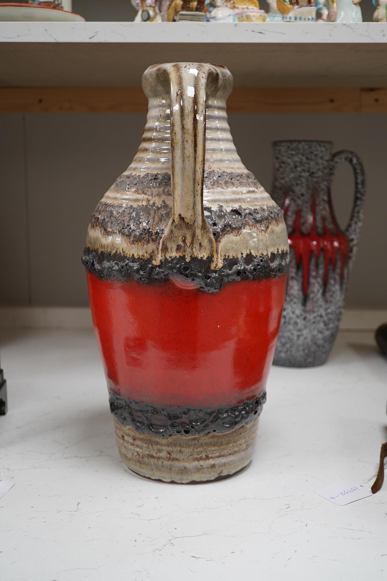 Three large West German vases including Bay and two volcanic glazed (fat lava), 42cm high. Condition - good